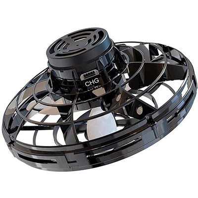 Mini UFO spinner drone toy with black ring base and black top, ready to spin