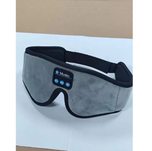 Gray Bluetooth sleep eye mask with built-in control panel and adjustable padded head strap