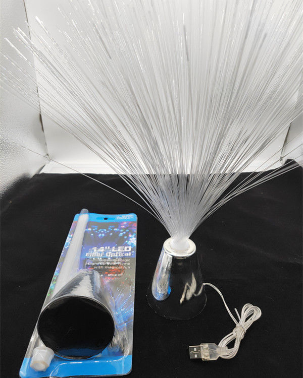 Fiber optic colour-changing lamp with clear crystal top, chrome base, and power cord