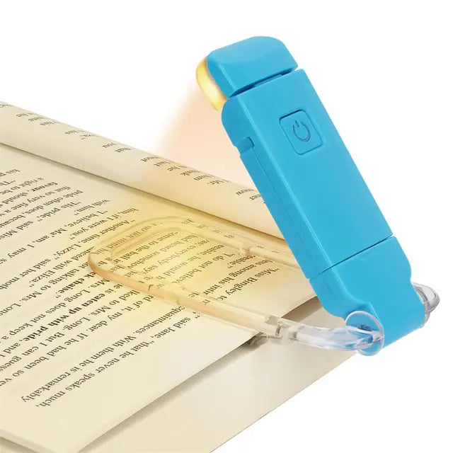 Clip-on LED book light, blue body with on/off button and clear clip