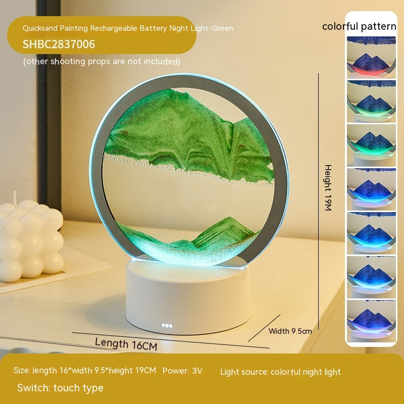Quicksand night lamp with circular glass top and white base, green sand glow