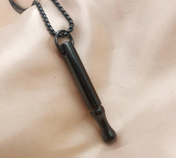 Breathing necklace pendant with black bead chain and dark capsule