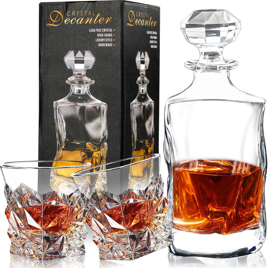 Crystal whiskey decanter set with cut-glass decanter and two clear old-fashioned tumblers