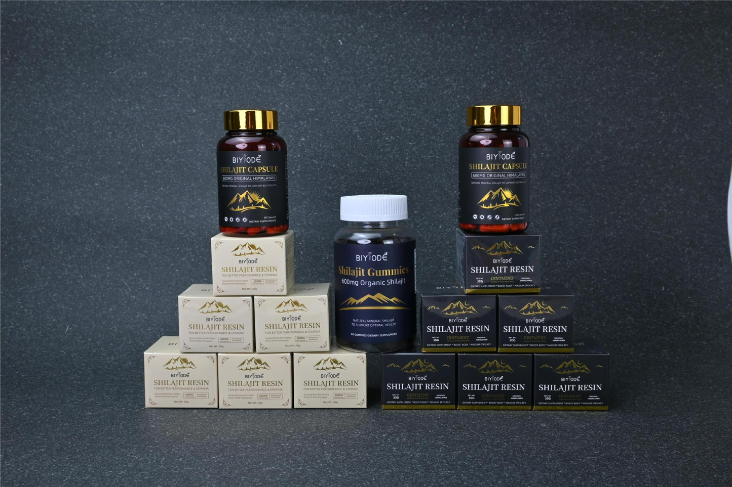 Shilajit resin product lineup with black-and-gold jars and bottles