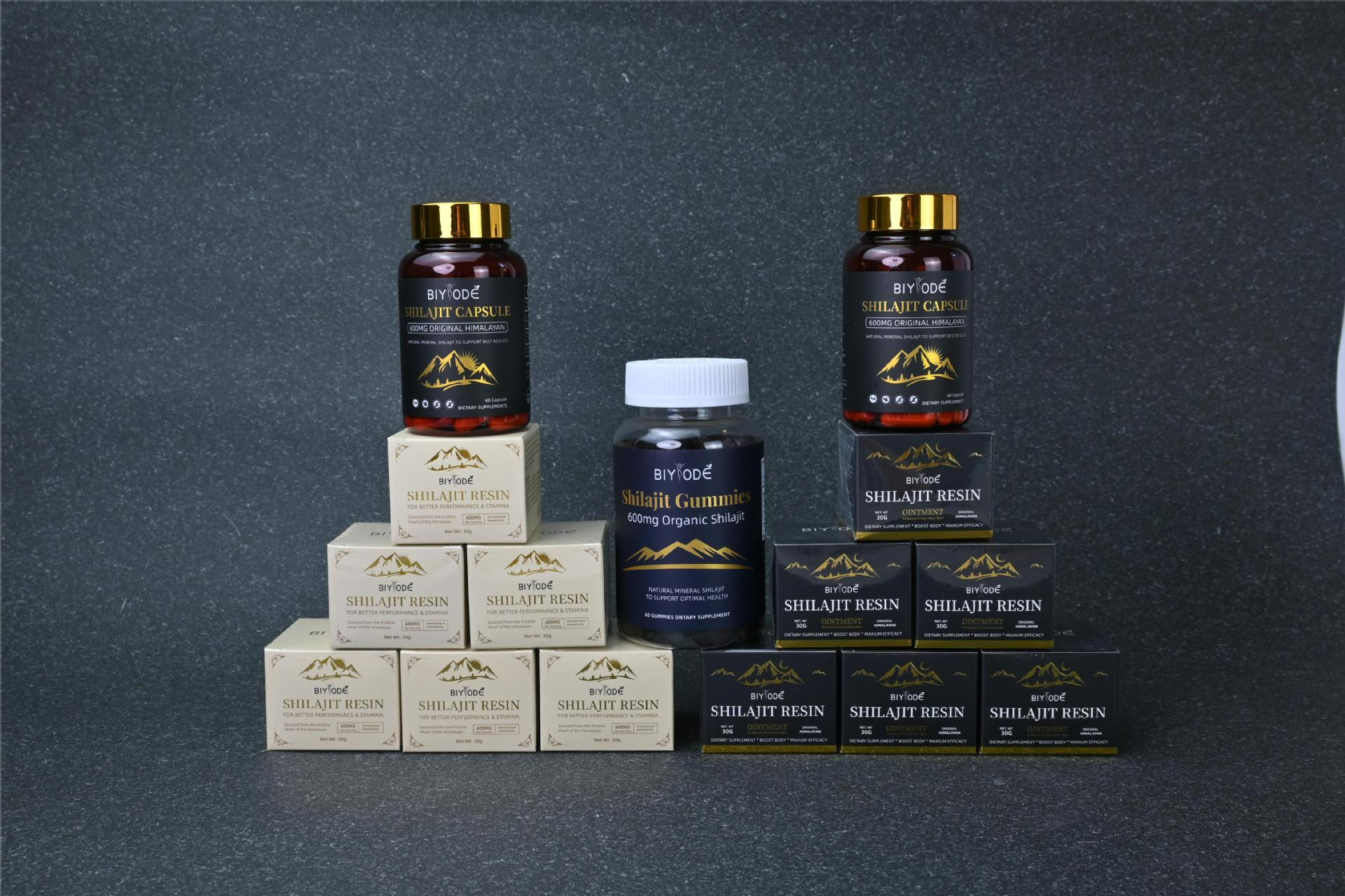 Shilajit resin product lineup with black-and-gold jars and bottles