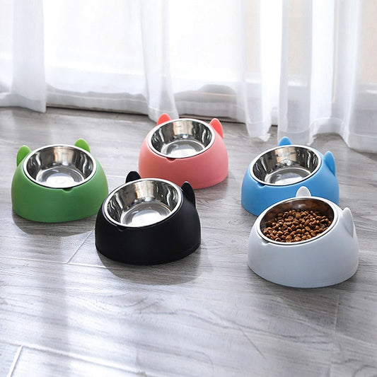 Set of raised cat food bowls in green, pink, black, and blue with stainless steel inserts