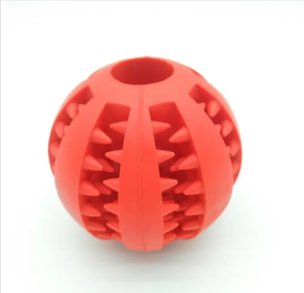 Red rubber treat-dispensing slow feeder dog ball with central divider and spike ridges