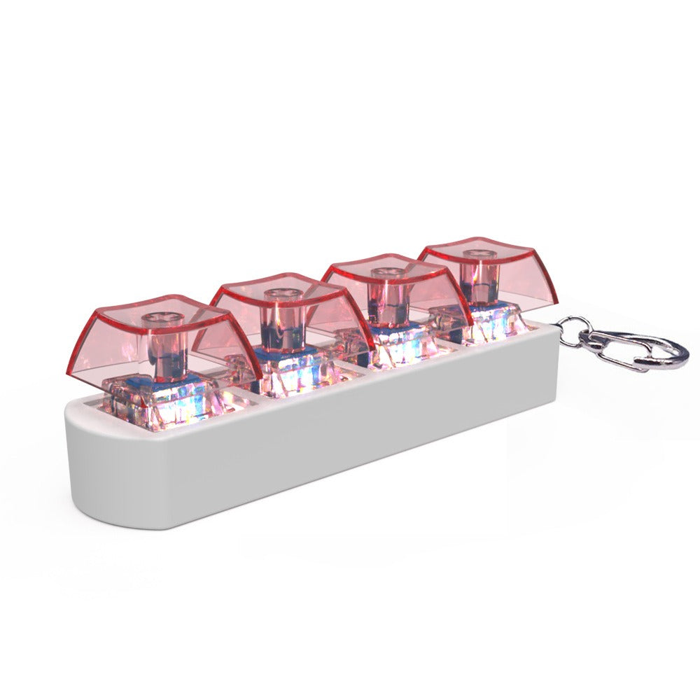 LED mechanical switch tester fidget keychain with clear module, red tops, and white base