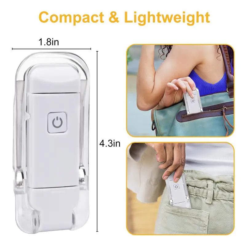 Compact white clip-on LED book light with clear clamp and power button