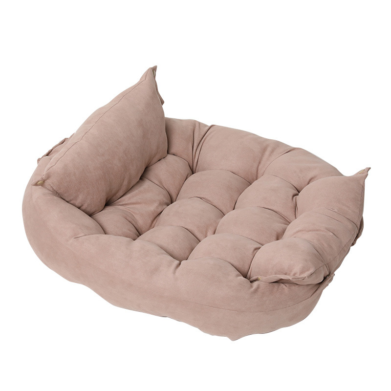 Foldable pet nest sofa bed in light blush with rolled bolsters and plush center