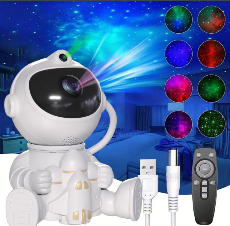 White astronaut 3D projector night light with cables and handheld remote.