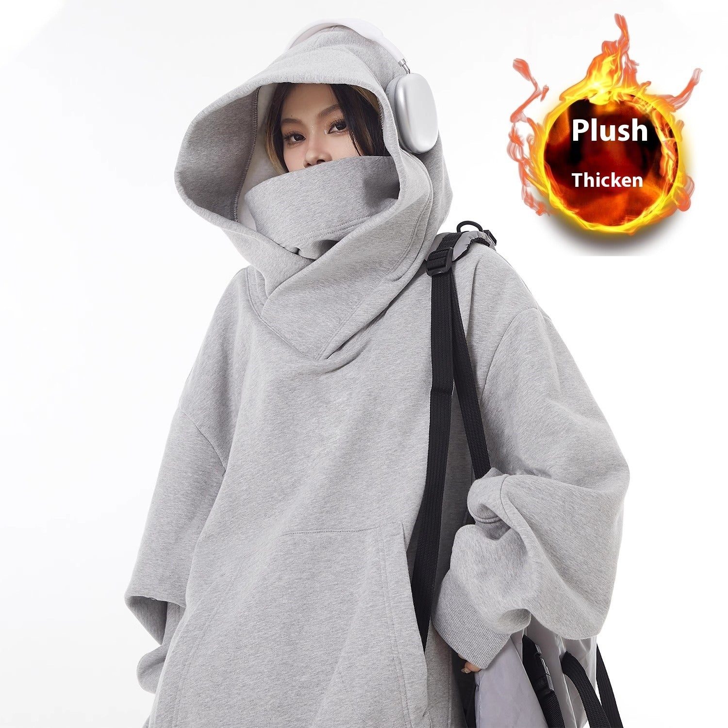 Gray high-collar fleece-lined oversized hoodie with hood up and kangaroo pocket