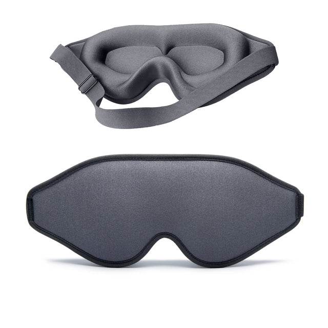 Contoured memory foam sleep mask set in gray tones, with adjustable side strap