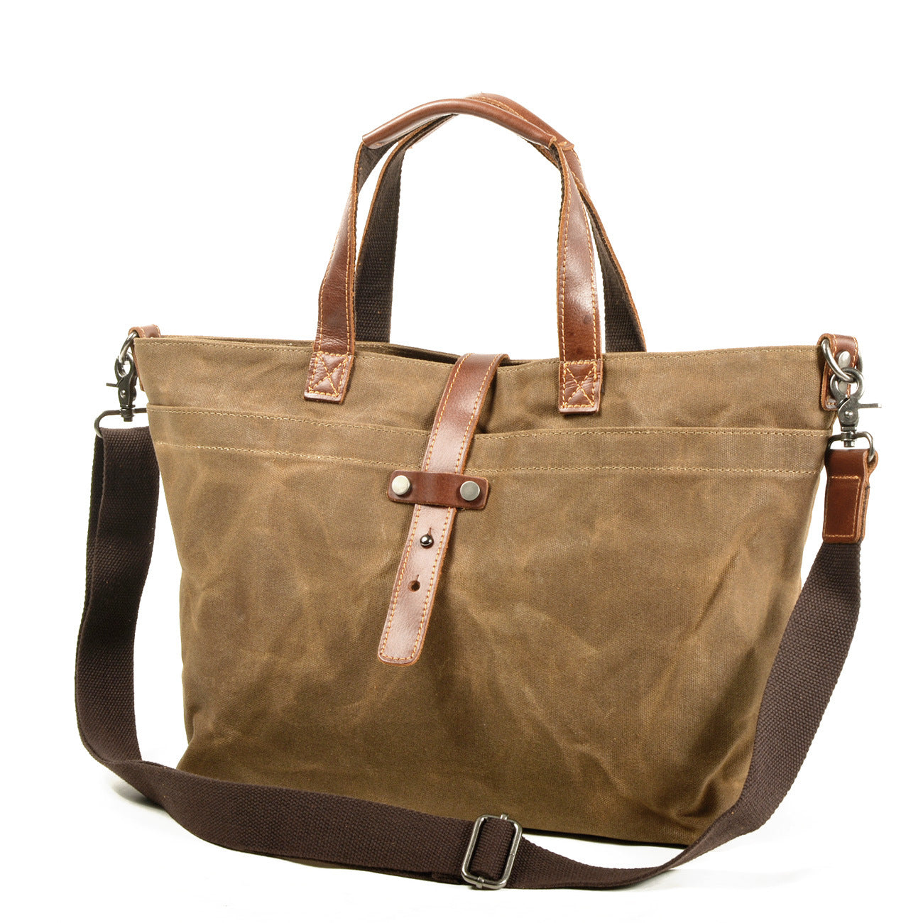 Large canvas tote bag with leather handles, front strap detail, and adjustable shoulder strap