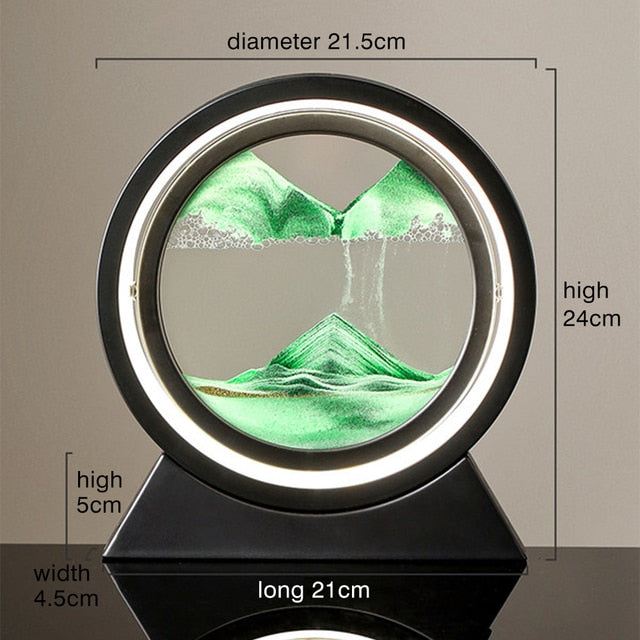 Quicksand table lamp with green sand in a circular lit ring and black base
