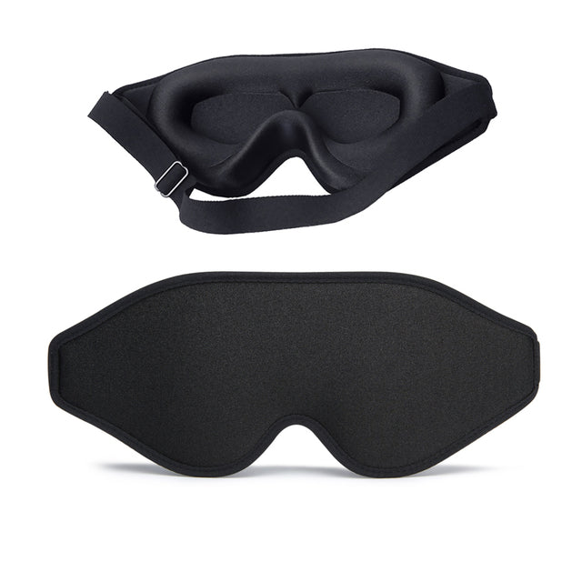 Black contoured sleep mask with wide elastic strap and padded eye cups