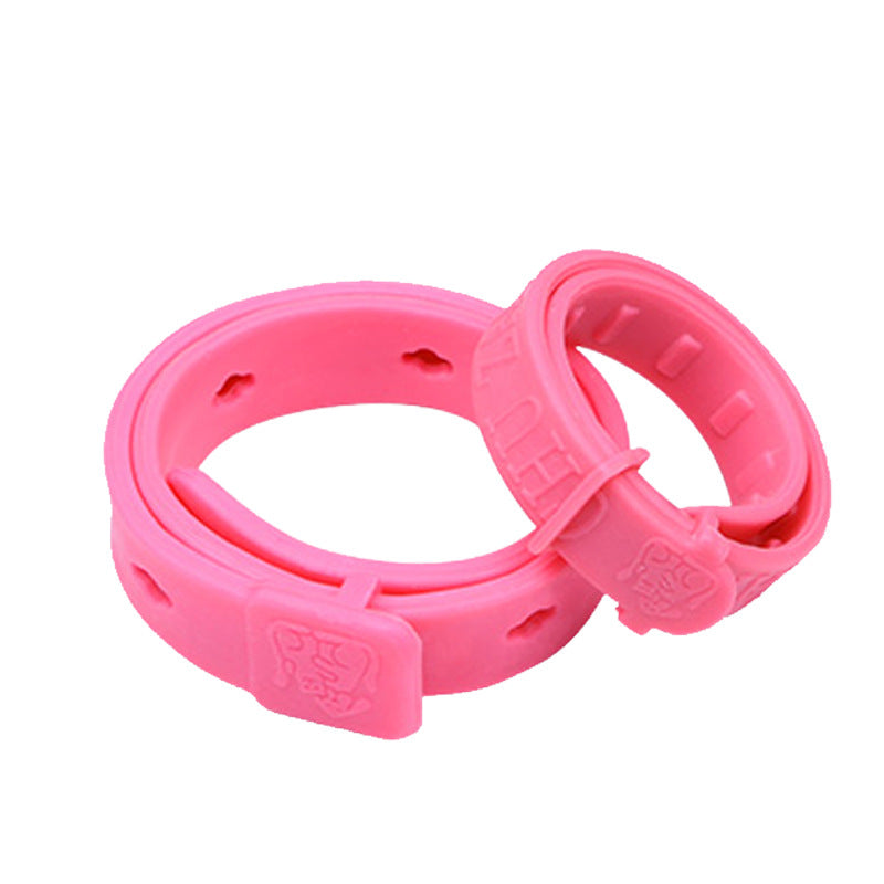 Pink pet flea and tick repellent collar with clasp, shown as two loops