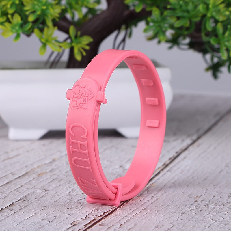 Pink pet flea and tick repellent collar shown as a standing loop