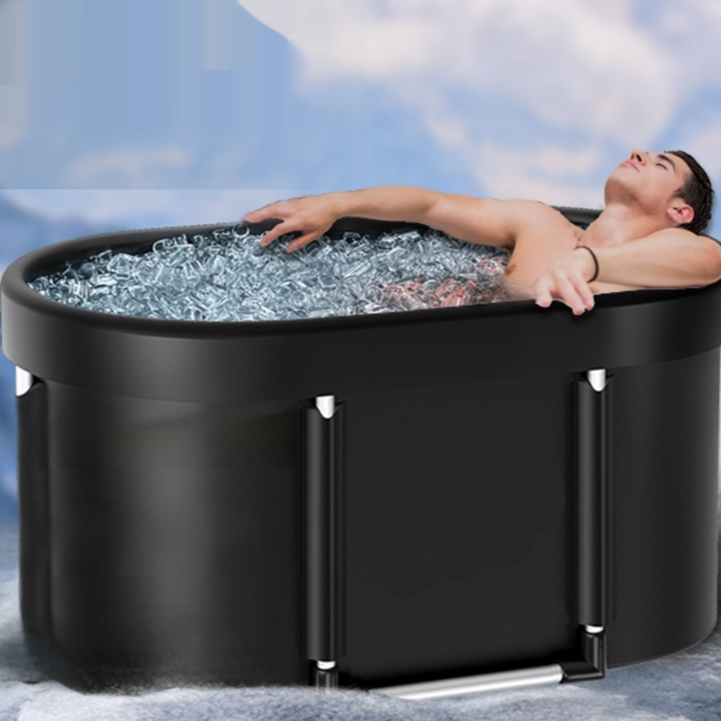 Black portable ice bath tub with foam insulation edge and filled water interior