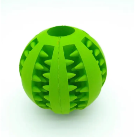 Green rubber treat-dispensing puzzle dog ball with ridged patterns