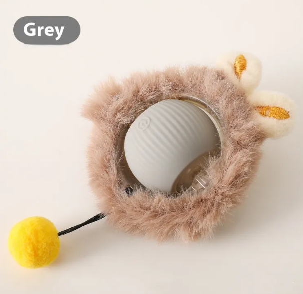 Self-rolling plush cat toy ball with gray outer cover, paw accents, and yellow charm