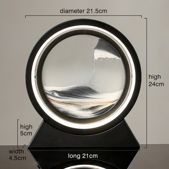 Round moving sand landscape table lamp with glowing ring and black base