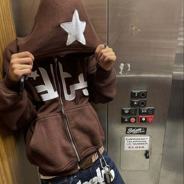 Women's coffee-brown zip-up hoodie featuring a white star on the hood and front zipper
