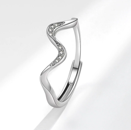 Silver wavy open adjustable ring with curved band and sparkling stone detail