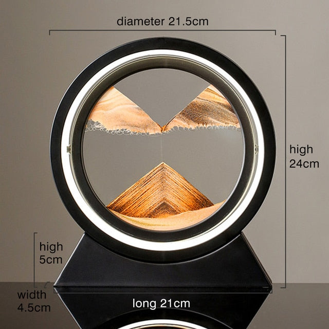 Gold and brown sand landscape table lamp with glowing circular LED ring and black base