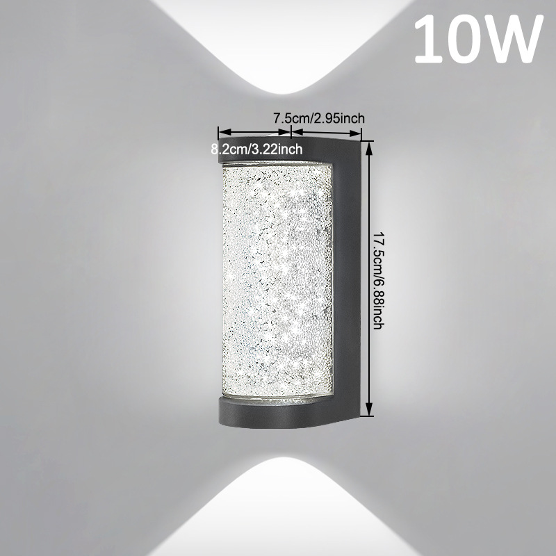 Square LED wall sconce with crystal-like clear glass shade and black backplate