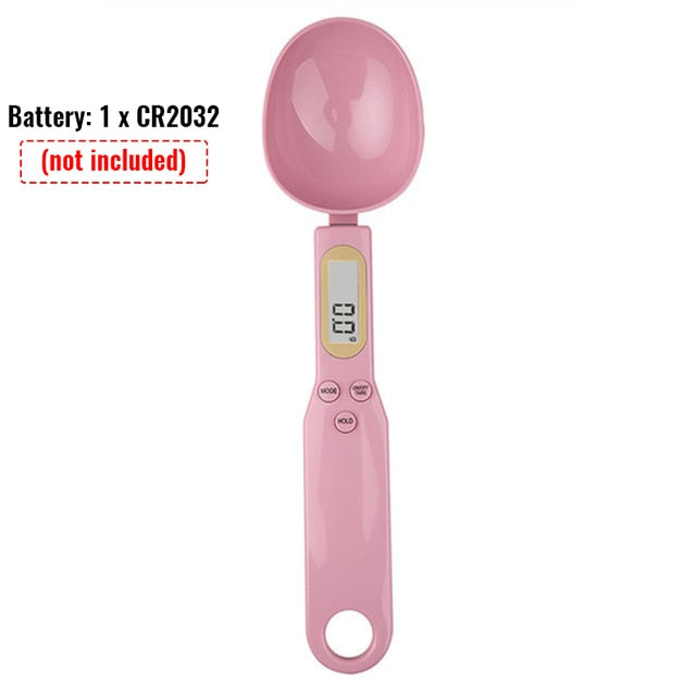 Pink digital measuring spoon scale with LCD display and scoop for ingredients