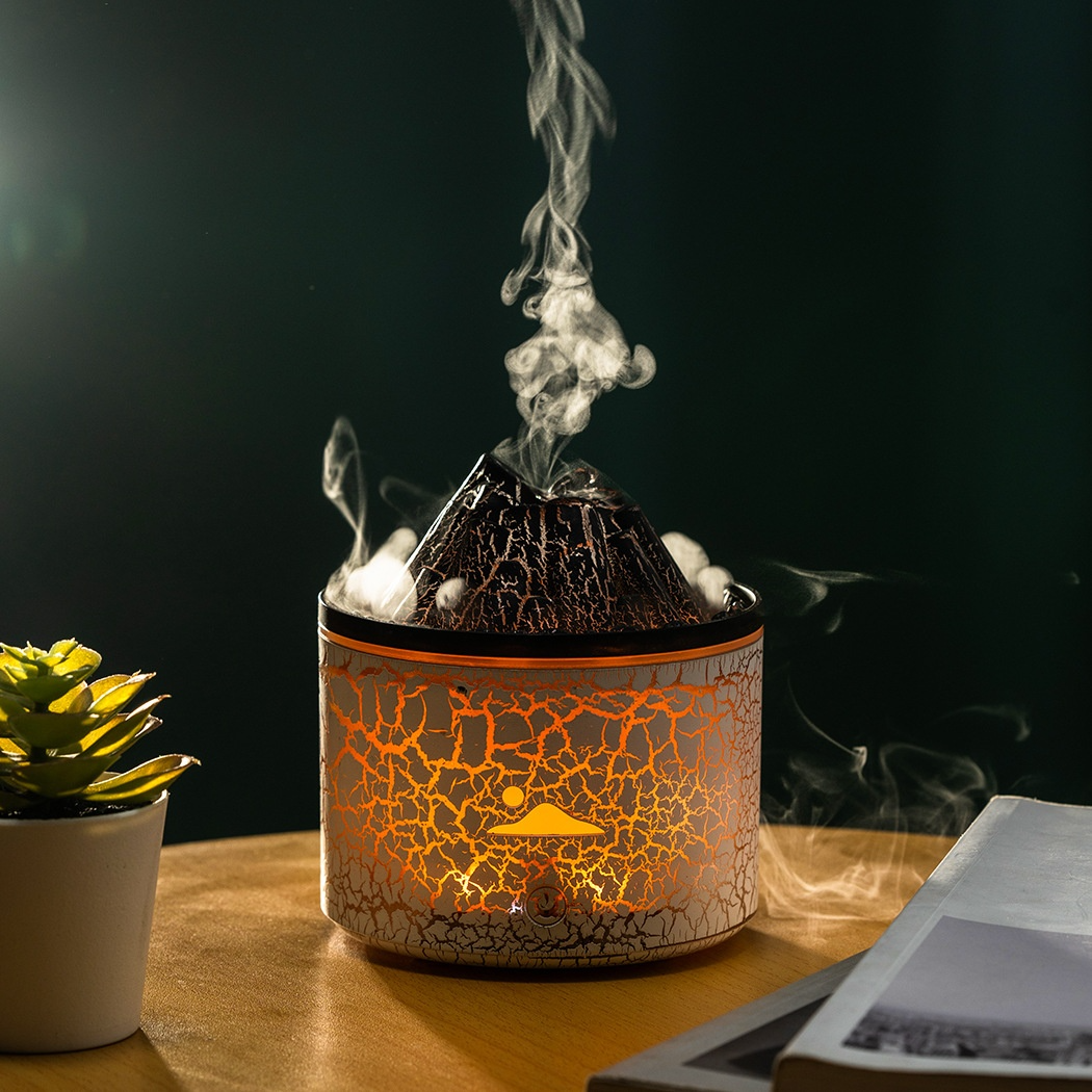 Crackled lava aroma diffuser with orange-glow base and steady steam rising