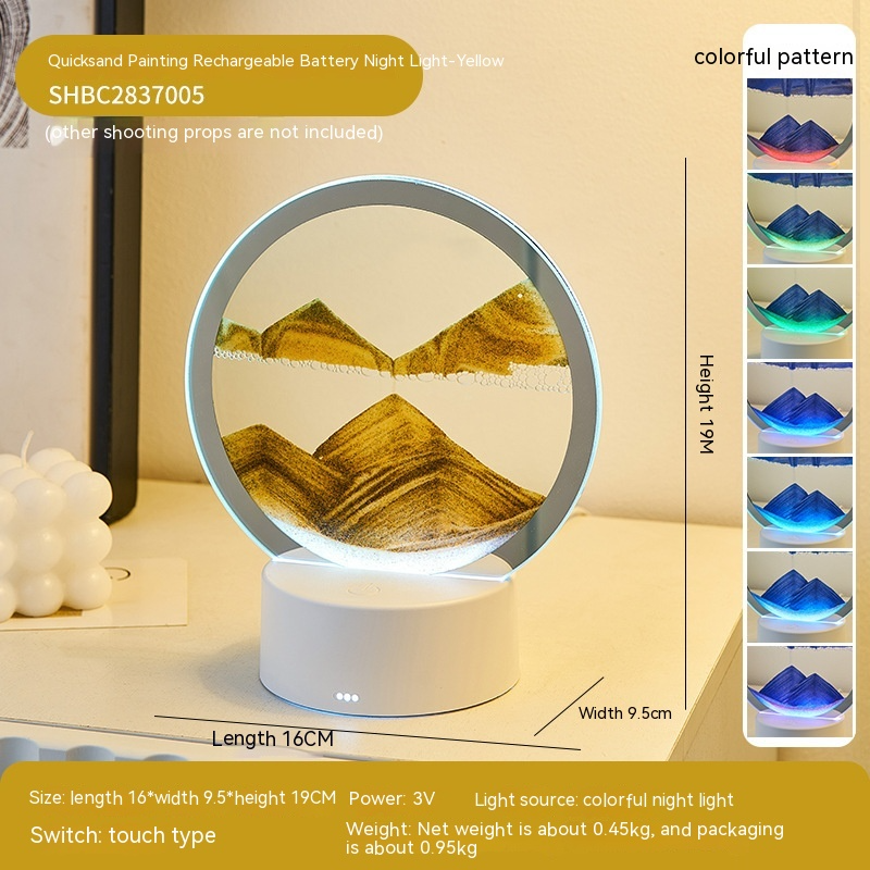 Quicksand night lamp with circular glass top and white base, yellow sand glow