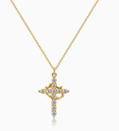 Gold-tone cross pendant necklace with round pave stones on a thin Y-style chain