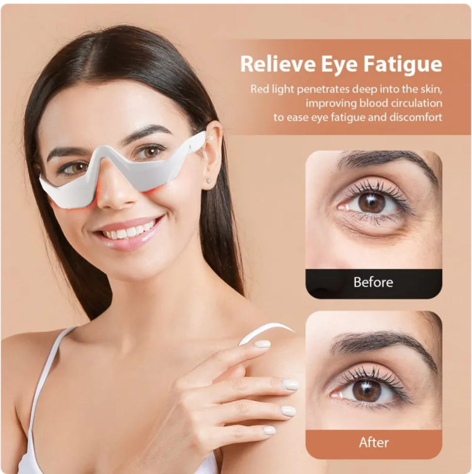 White eye massager fitted on face with under-eye contact pads