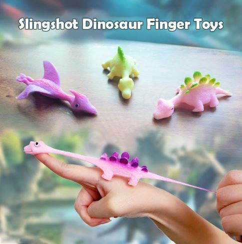 Purple and pink dinosaur slingshot finger toys with green and yellow variants