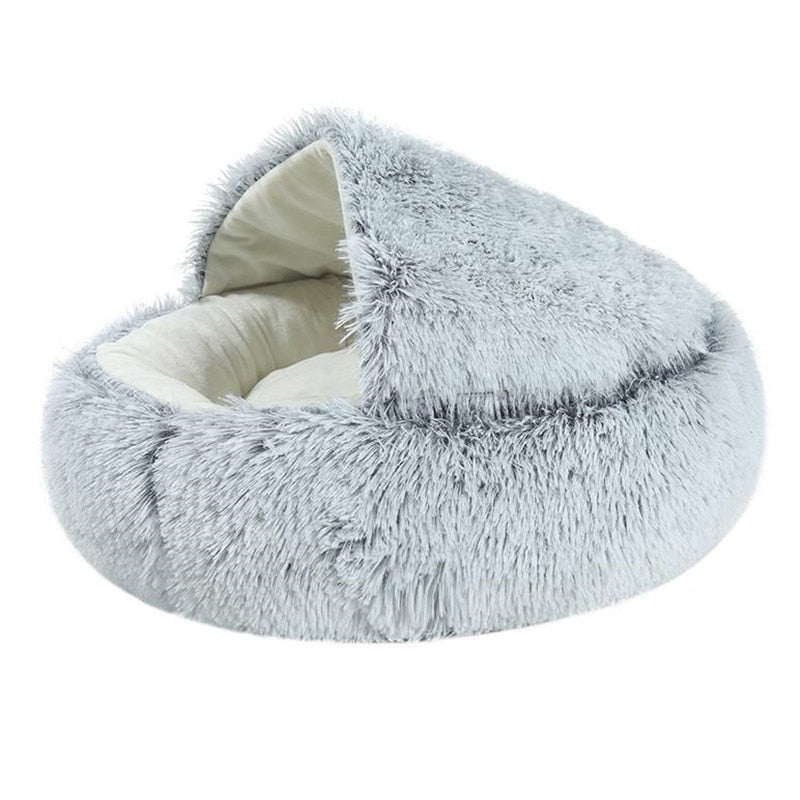 2-in-1 plush pet bed with raised rim and tunnel entrance, light blue exterior, light inner cushion