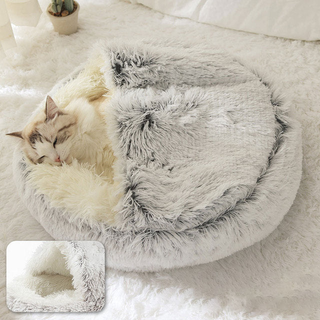 Gray plush pet bed with raised rim and tunnel entrance