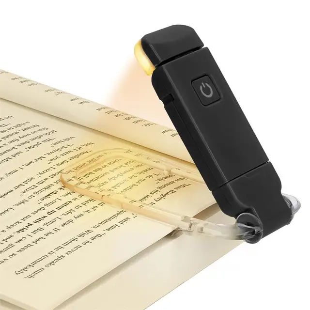 Clip-on LED book light, black body with on/off button and clear clip