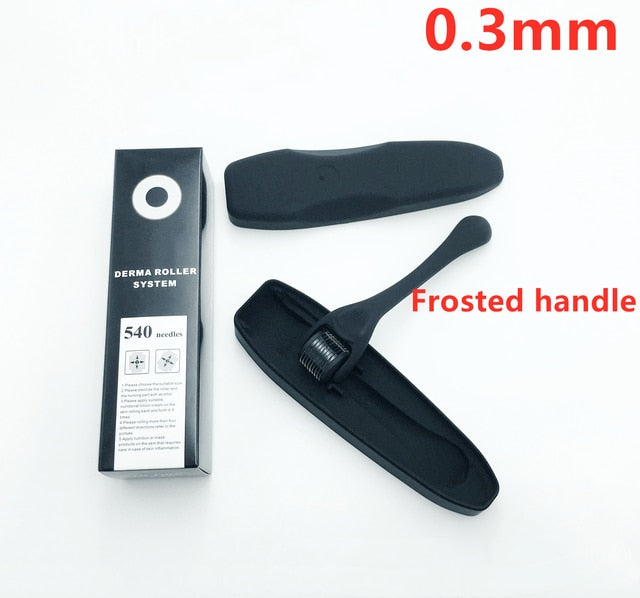 Black microneedling face roller with frosted handle, plus product box