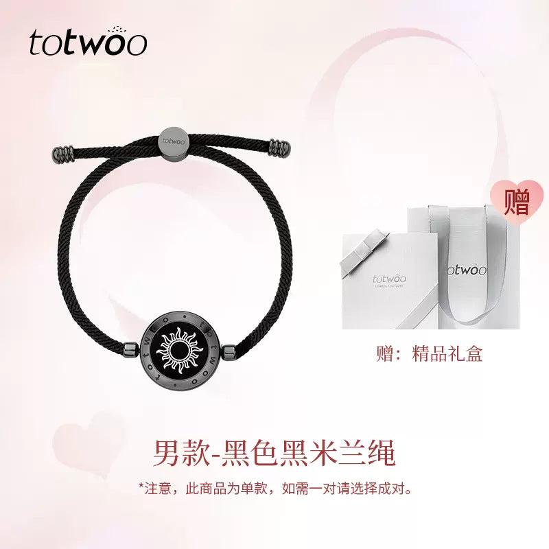 Black braided cord smart bracelet with round sun dial and small center charm