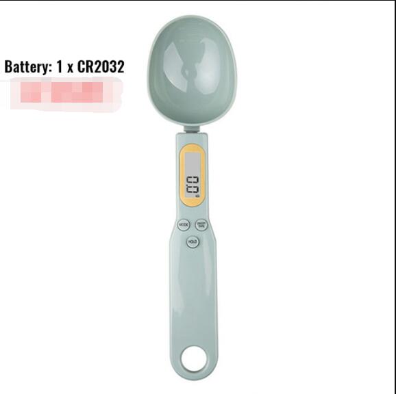 Digital measuring spoon scale, light teal glossy body with LCD screen and spoon bowl