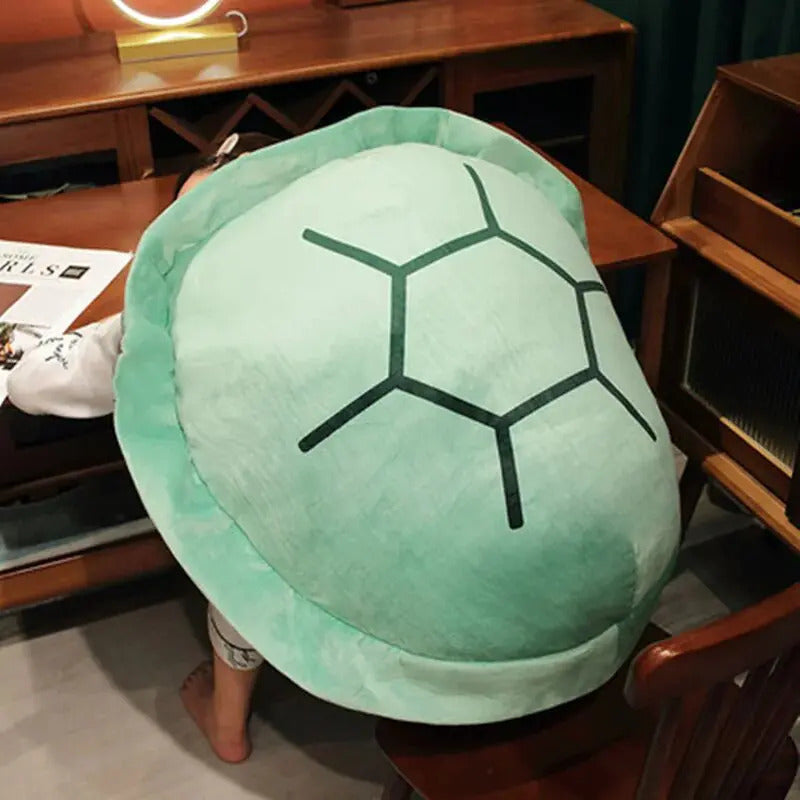 Plush turtle-shell pillow wrap, green plush back with gray segmented shell pattern