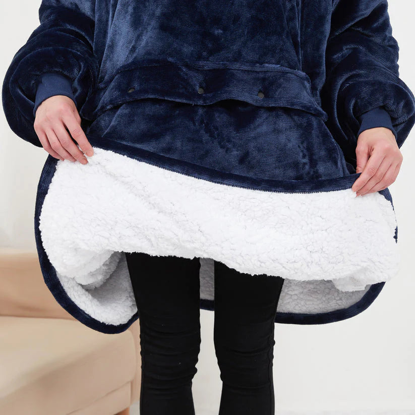 Heated hoodie blanket with hood, dark navy plush and white lining under the hem