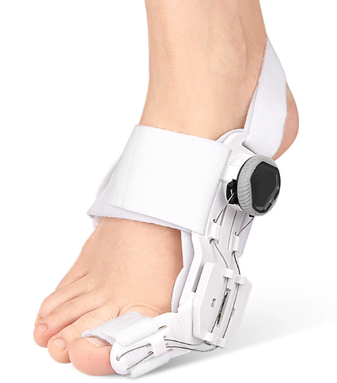 White adjustable bunion corrector brace with toe separator and circular adjustment knob, worn