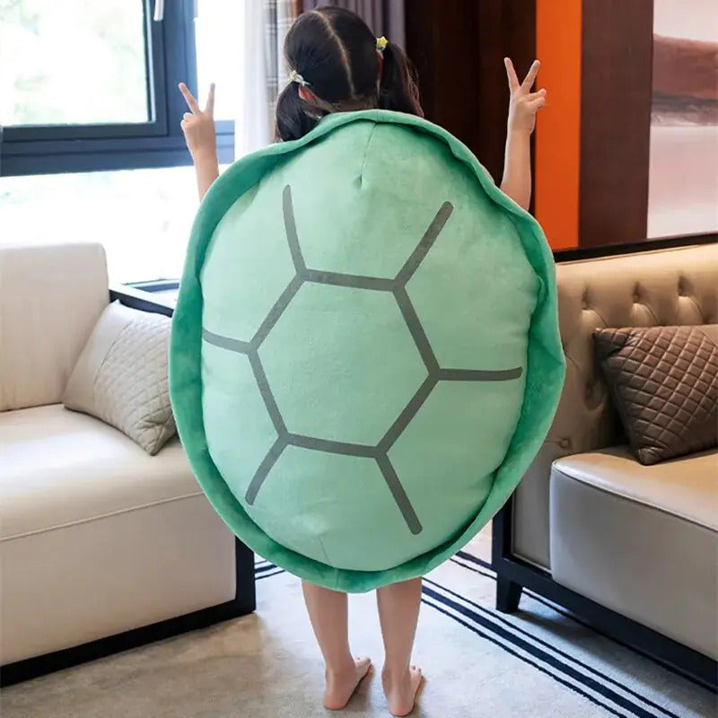 Plush turtle-shell pillow wrap, green plush back with gray segmented shell pattern