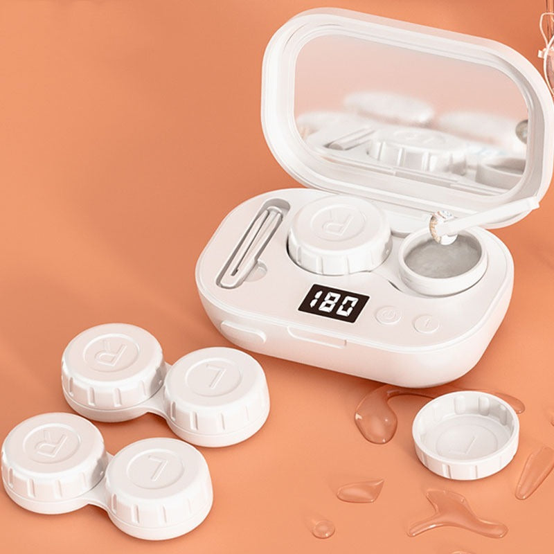 Ultrasonic contact lens cleaner with open lid and four included circular cleaning caps