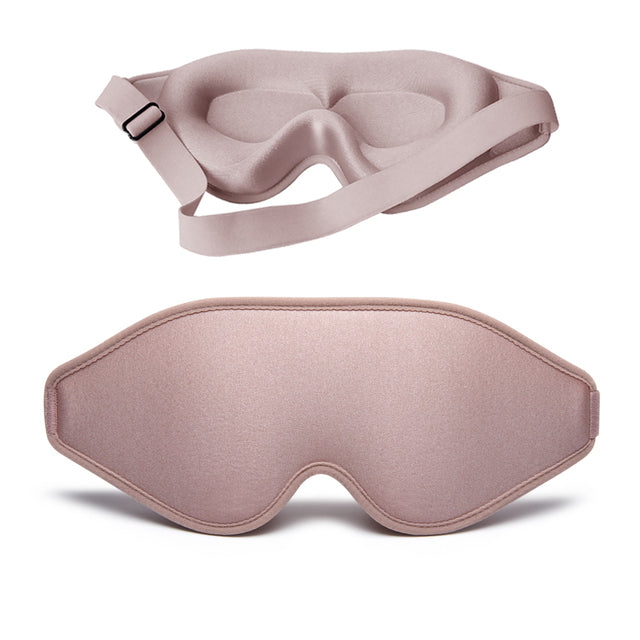 Pink and beige contoured memory foam sleep masks with adjustable strap and eye cups