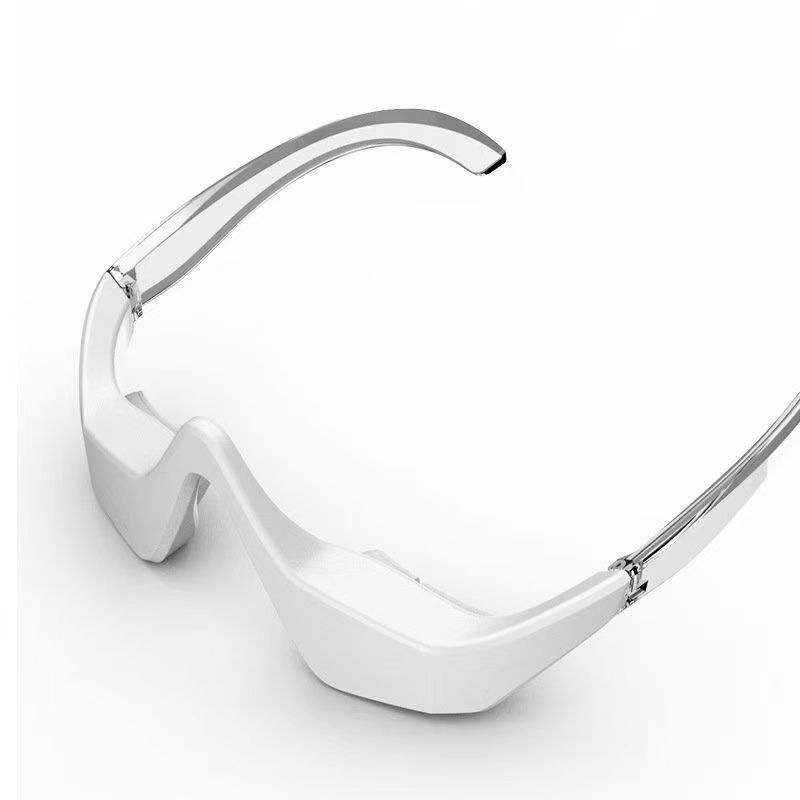 White eye massager with curved headband frame and hinged contact arms