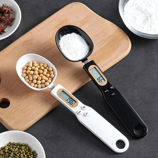 Set of digital measuring spoon scales: white and black, each with LCD display